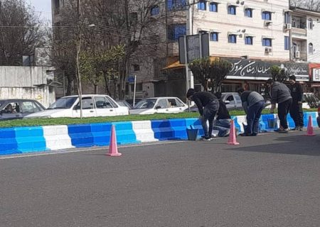 زیباسازی محیط شهری با انجام عملیات رنگ آمیزی جداول در مناطق پنجگانه شهر رشت